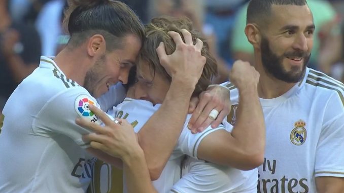 Bale and Modric celebrating a goal against Granada