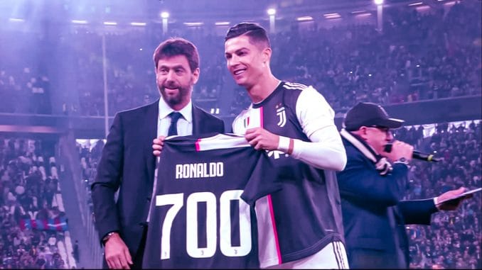 Cristiano Ronaldo (Jersey No. 7) was presented a jersey having 700 mentioned