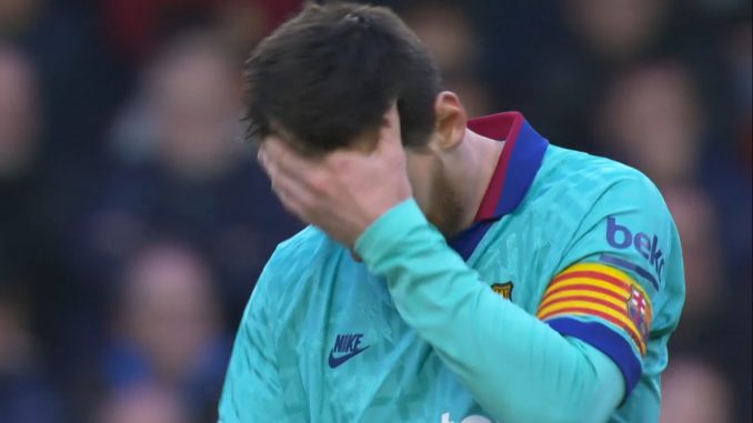 Barcelona vs Valencia - Lionel Messi reacts as his free-kick was saved by Valencia goalkeeper. Maxi Lopez scored a double for Valencia.