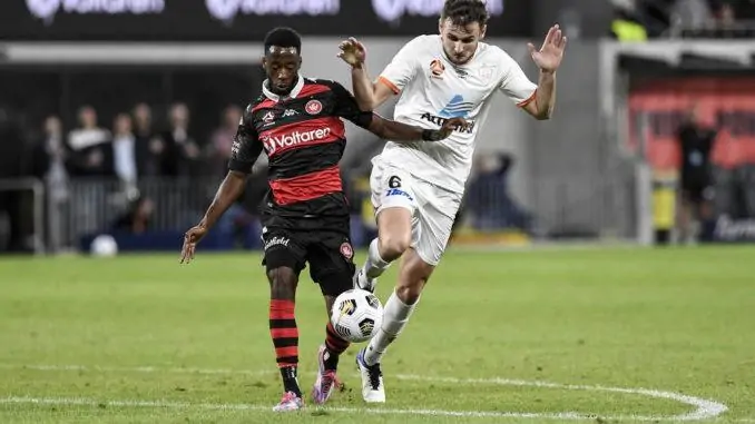 Bruce Kamau of Western Sydney Wanderers-Macaulay Gillesphey of Brisbane Roar