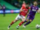 Bruno Fornaroli of Perth Glory and Tim Payne of Wellington Phoenix FC