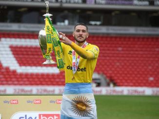 Emiliano Buendia of Norwich City with the EFL Championship trophy