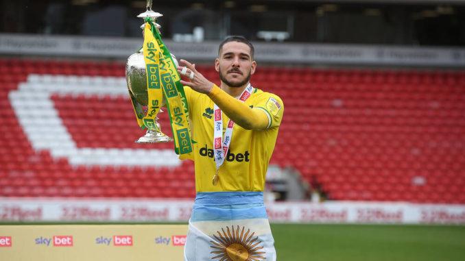 Emiliano Buendia of Norwich City with the EFL Championship trophy