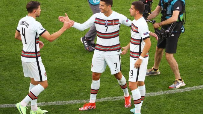 Cristiano Ronaldo celebrates with Ruben Dias and Andre Silva-Portugal vs Hungary
