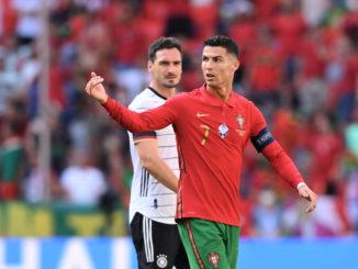 Cristiano Ronaldo of Portugal and Mats Hummels of Germany