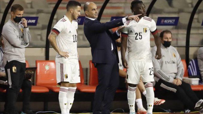 Eden Hazard, Jeremy Doku and Roberto Martinez of Belgium