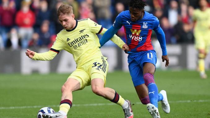 Emile Smith Rowe of Arsenal and Wilfried Zaha of Crystal Palace during the Premier League