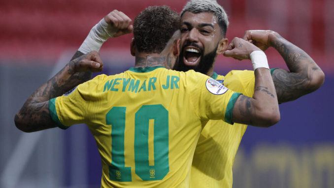 Gabriel Barbosa of Brazil celebrates his goal with Neymar in the 89th minute