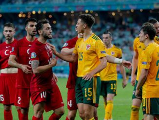 Hakan Calhanoglu of Turkey and Ethan Ampadu of Wales-Euro 2020, Group A-Turkey vs Wales at Baku Olympic Stadium