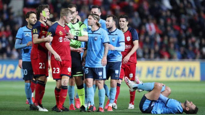 Jordan Elsey of Adelaide United-Deyvison Da Silva of Sydney FC