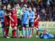 Jordan Elsey of Adelaide United-Deyvison Da Silva of Sydney FC