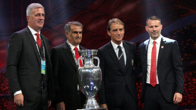 Managers-Vladimir Petkovic of Switzerland, Senol Gunes of Turkey, Roberto Mancini of Italy and Ryan Giggs of Wales