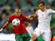Pepe of Portugal vies with Diego Llorente of Spain
