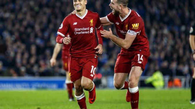 Philippe Coutinho and Jordan Henderson of Liverpool celebrating goal against Brighton