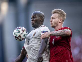Simon Kjaer of Denmark and Romelu Lukaku of Belgium