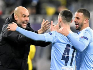 Pep Guardiola, Phil Foden and Kyle Walker of Manchester City