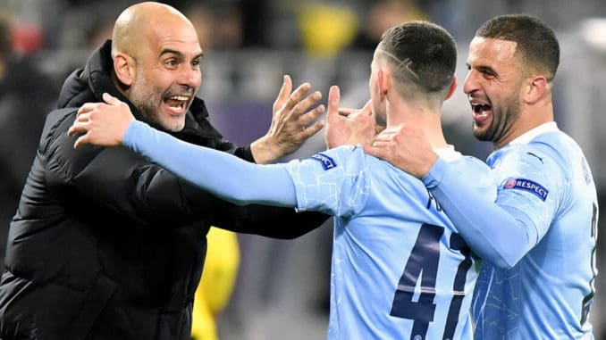 Pep Guardiola, Phil Foden and Kyle Walker of Manchester City