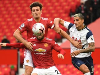 Harry Maguire and Luke Shaw of Manchester United and Eric Lamela of Tottenham-04.10.2020