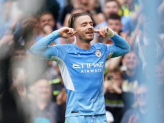 Jack Grealish of Manchester City celebrates scoring against Norwich City