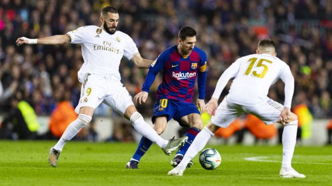 Karim Benzema and Valverde of Real Madrid and Lionel Messi of Barcelona