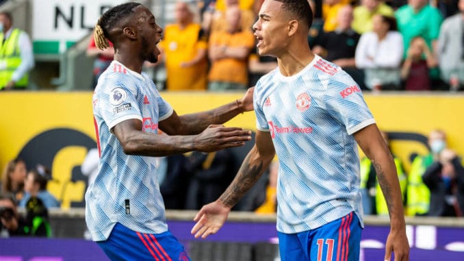 Mason Greenwood and Aaron Wan-Bissaka of Manchester United celebrate against Wolves in Premier League