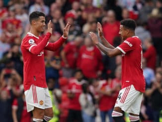 Cristiano Ronaldo and Jesse Lingard celebrate victory during the Premier League match at Old Trafford