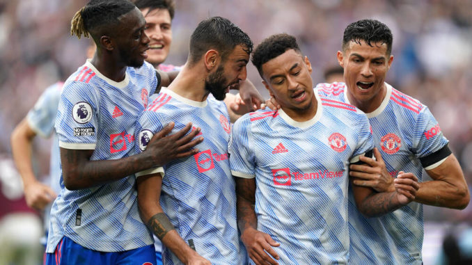 Jesse Lingard of Manchester United refuse to celebrate after scoring with Cristiano Ronaldo against West Ham