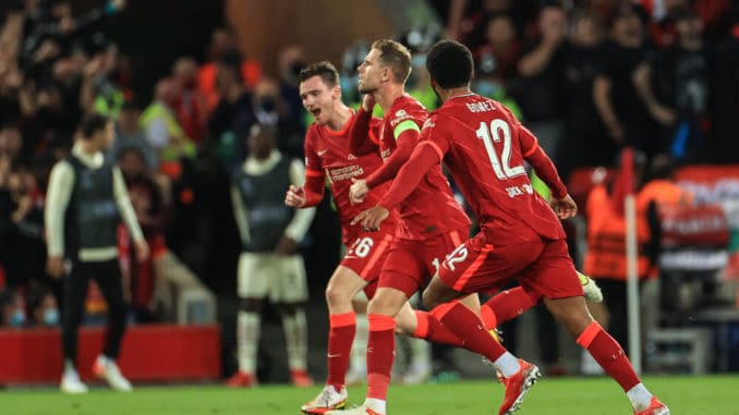 Jordan Henderson of Liverpool celebrates his goal against AC Milan