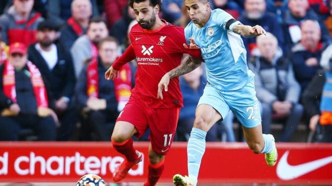 Mohamed Salah of Liverpool and Joao Cancelo of Manchester City