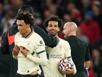 Premier League-Old Trafford Liverpool hat-trick scorer Mohamed Salah celebrates with the match ball