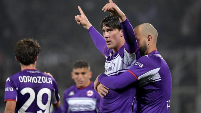Dusan Vlahovic of ACF Fiorentina celebrates with Riccardo Saponara against AC Milan