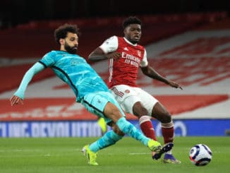 Mohamed Salah of Liverpool and Thomas Partey of Arsenal