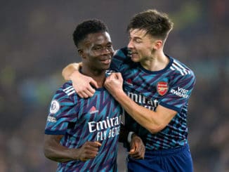 Bukayo Saka of Arsenal celebrates with team-mate Kieran Tierney