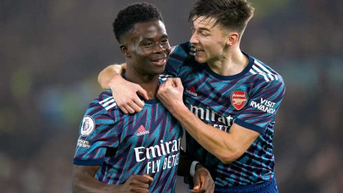 Bukayo Saka of Arsenal celebrates with team-mate Kieran Tierney
