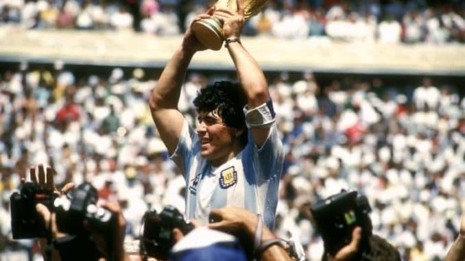Diego Maradona of Argentina with FIFA World Cup trophy in 1986