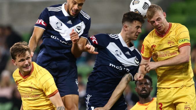 Yaya Dukuly of Adelaide United and Marco Rojas of Melbourne Victory