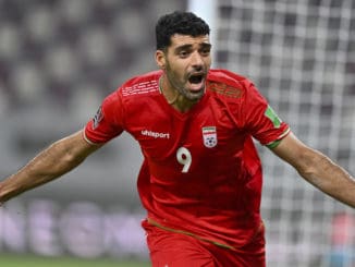 Mehdi Taremi of Iran celebrates after scoring during the FIFA World Cup qualifier against Iraq