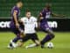 Matthew Derbyshire of Macarthur FC goes to ground as Jason Geria of Perth Glory breaks with the ball and Jonathan Aspropotamitis supports