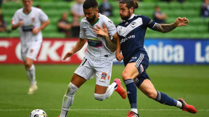 Ramy Najjarine of Newcastle Jets and Jacob Butterfield of Melbourne Victory