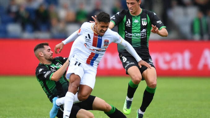 Ben Garuccio of Western United tackles Daniel Penha of the Jets